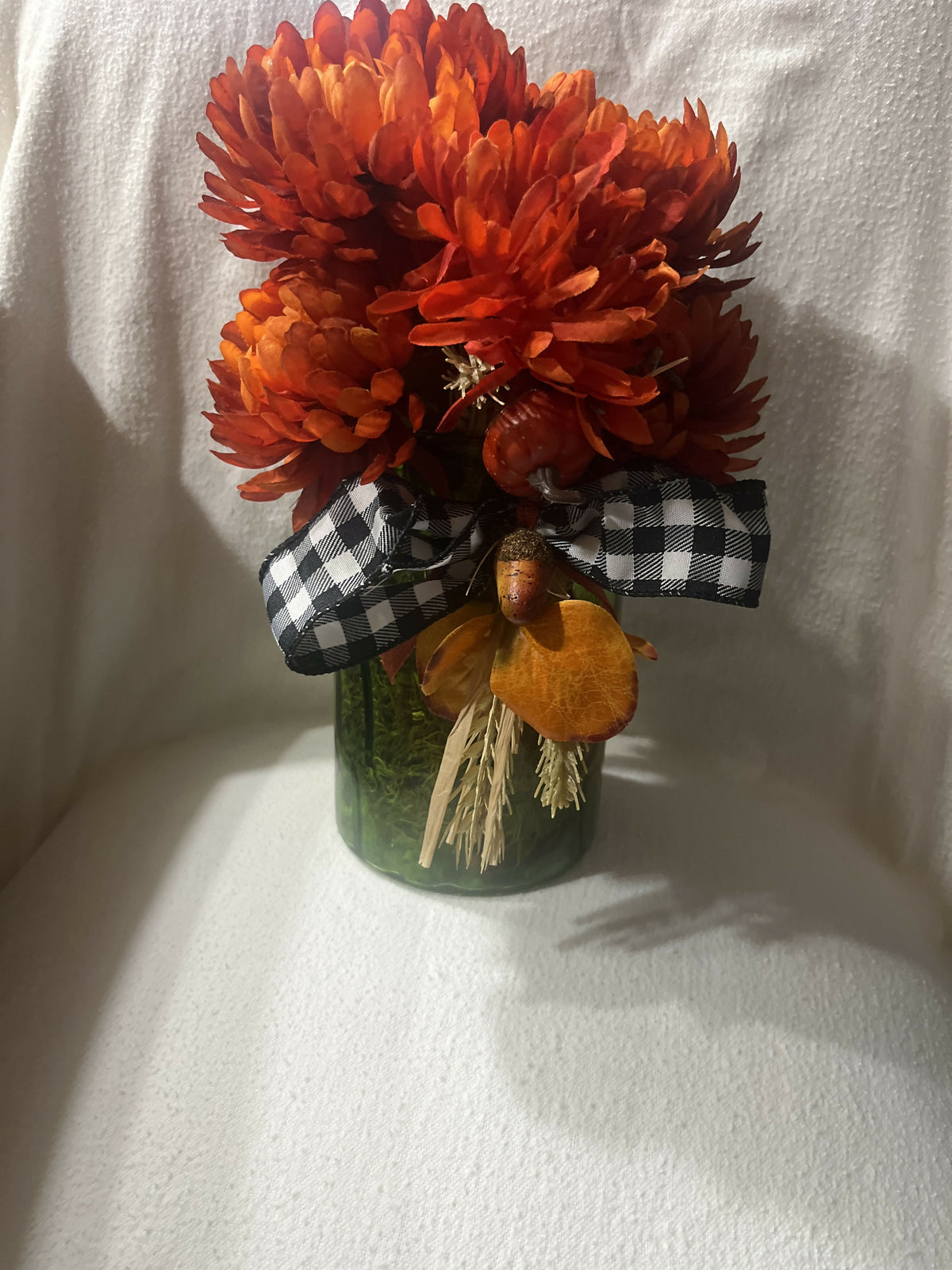 Fall flowers with green vase