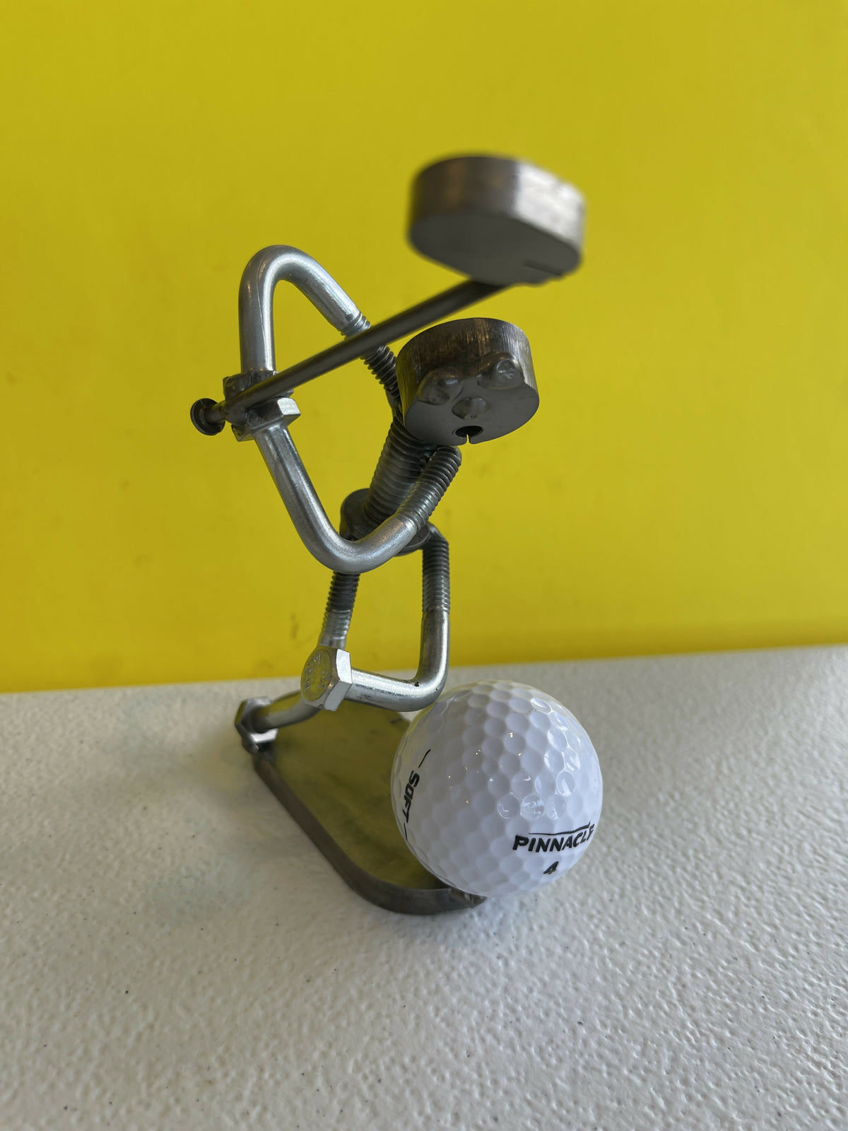 Golfer with leg up