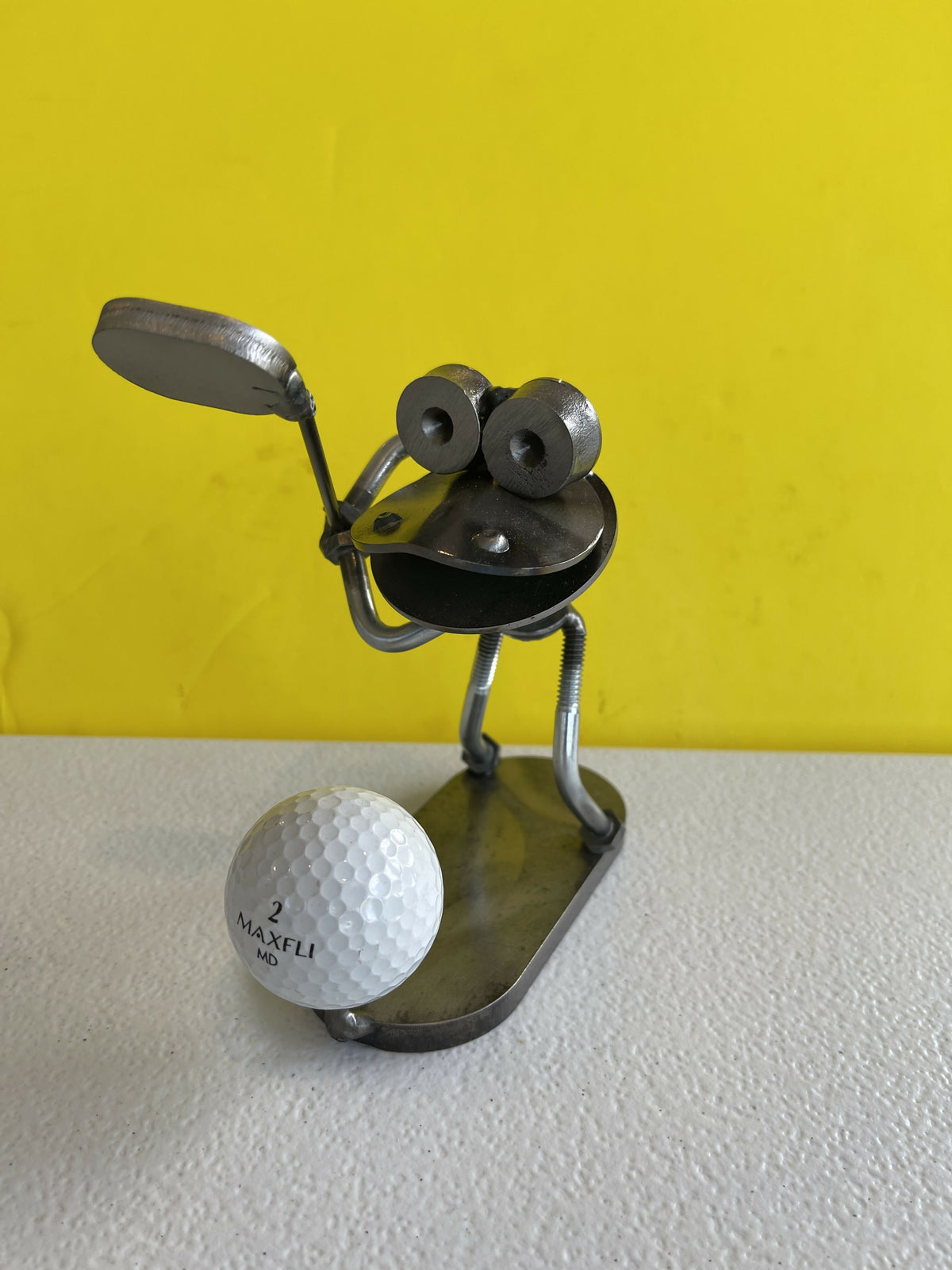 Golfer with frog face