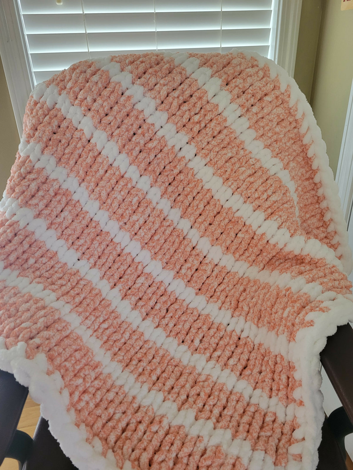 Cantaloupe and white baby/lap blanket